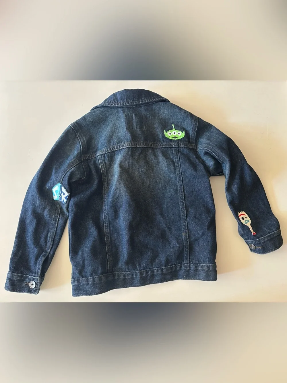 Boys Dark Blue Denim Jacket with hand sewn on Toy Story Patches